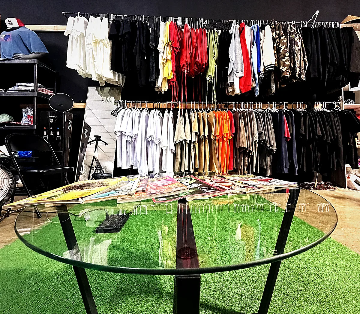 Racks of finished custom apparel on the Humanitees shop floor